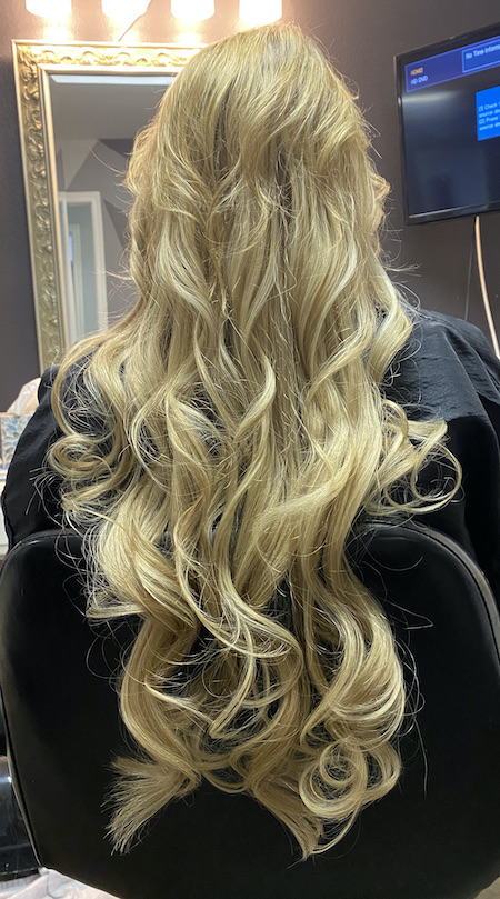 Curled layered blobe hair extenisons.